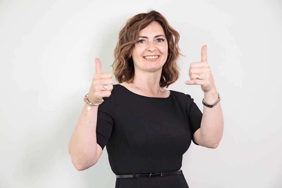 woman smile to camera about blended fees