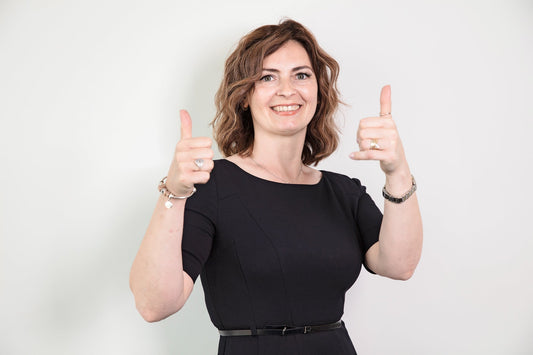 woman smile to camera about blended fees