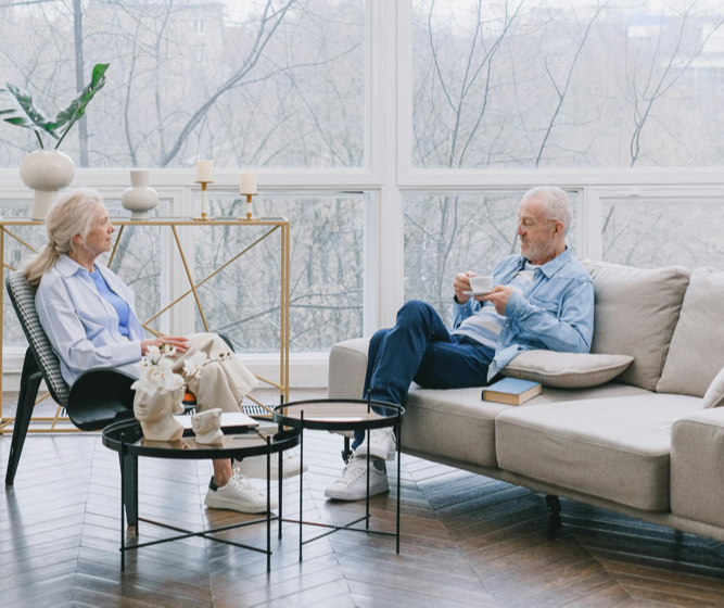 An older couple in a peaceful home setting, enjoying their time. Good planning can help ensure you can relax knowing your home and estate are protected.